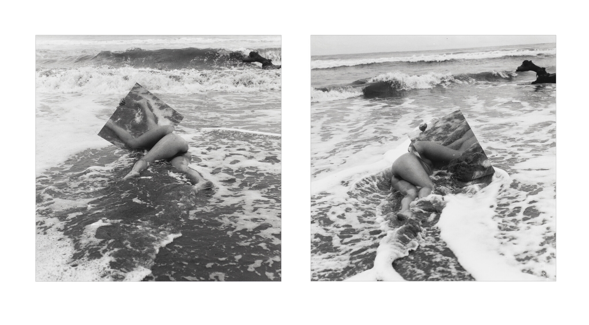 A person lies partially submerged in surf while a mirror covers their upper body, reflecting waves.