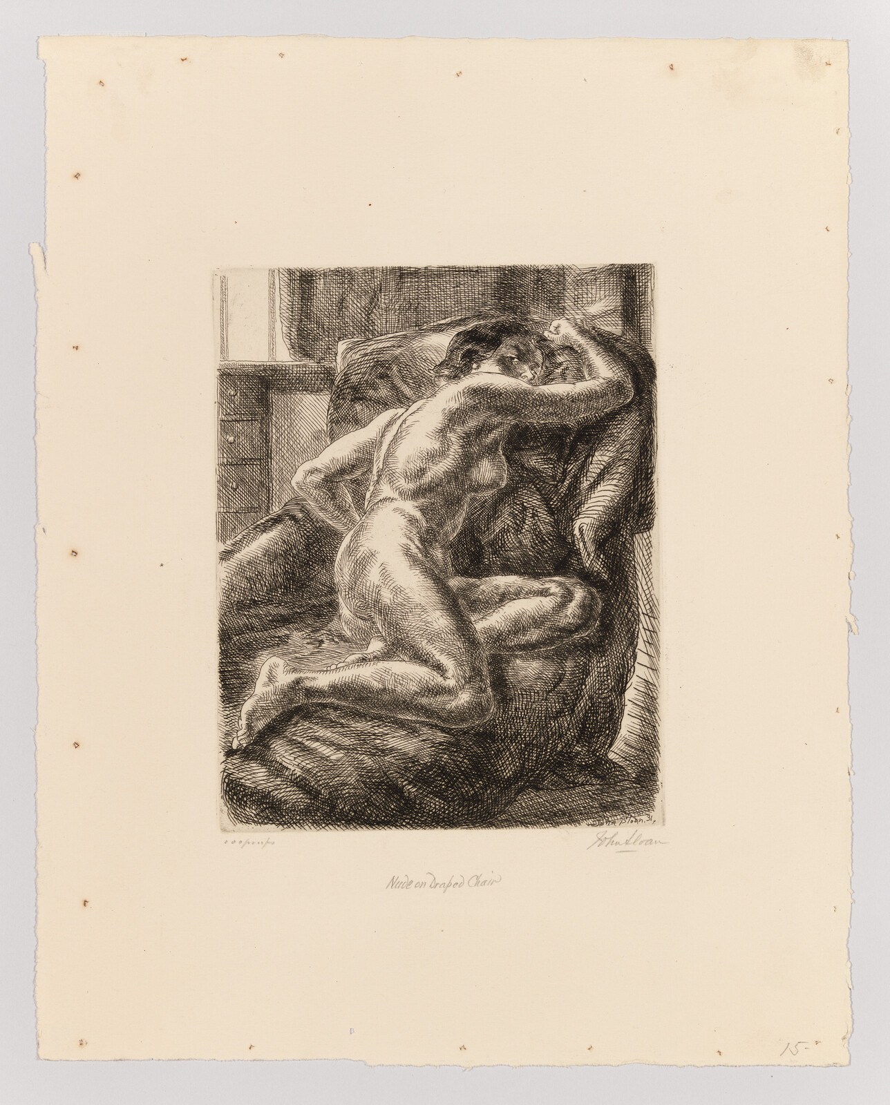 A nude person kneels on a draped chair, leaning forward with one arm resting on the back.