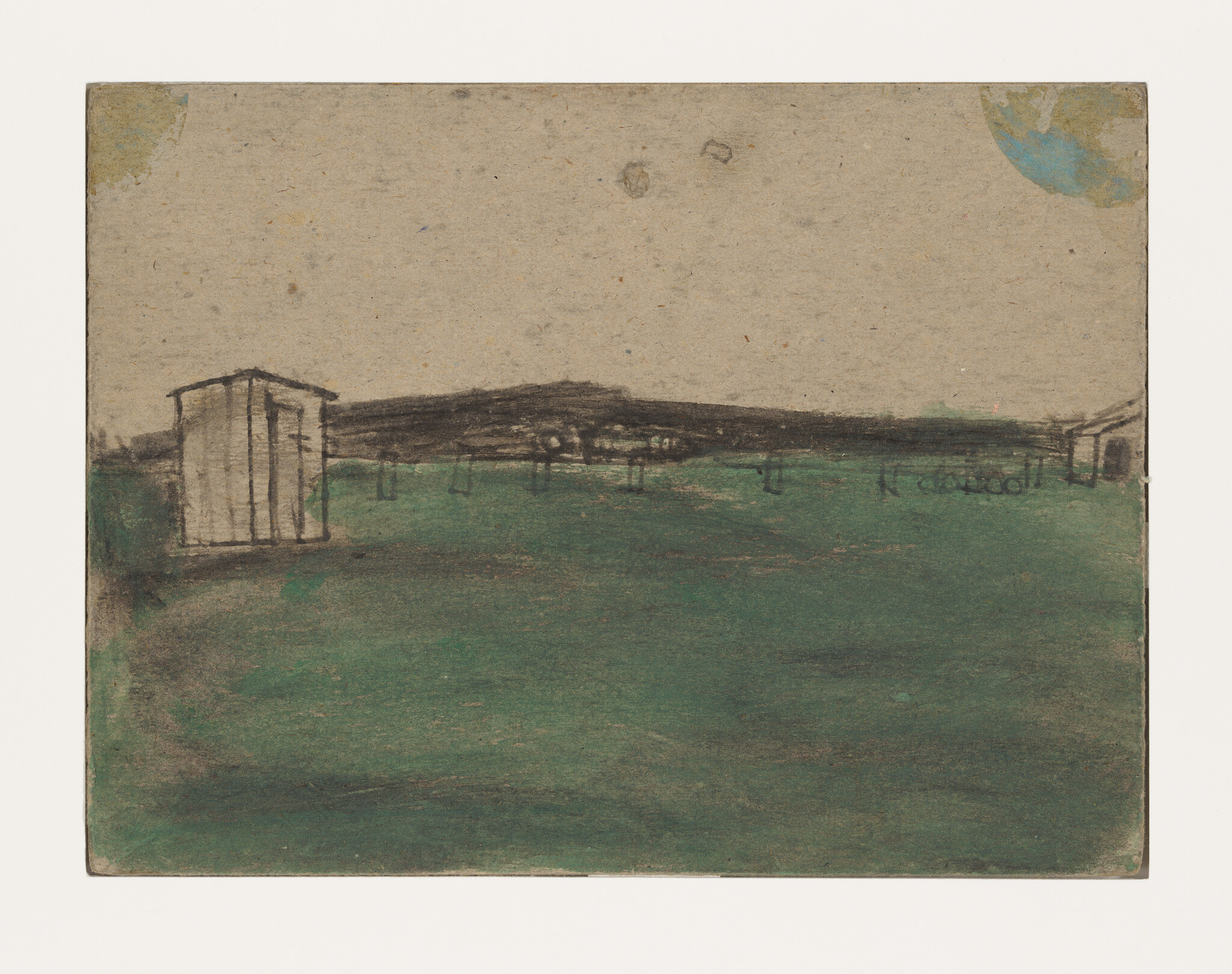 A small wooden shed stands on the edge of a wide green field beneath distant dark hills.