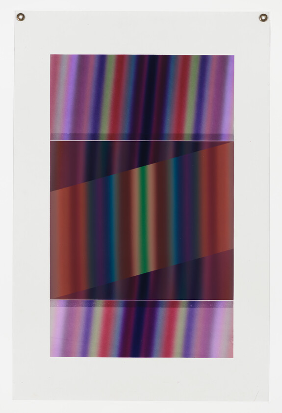 A white hanging poster with vivid vertical color stripes and a diagonal darker band across the center.