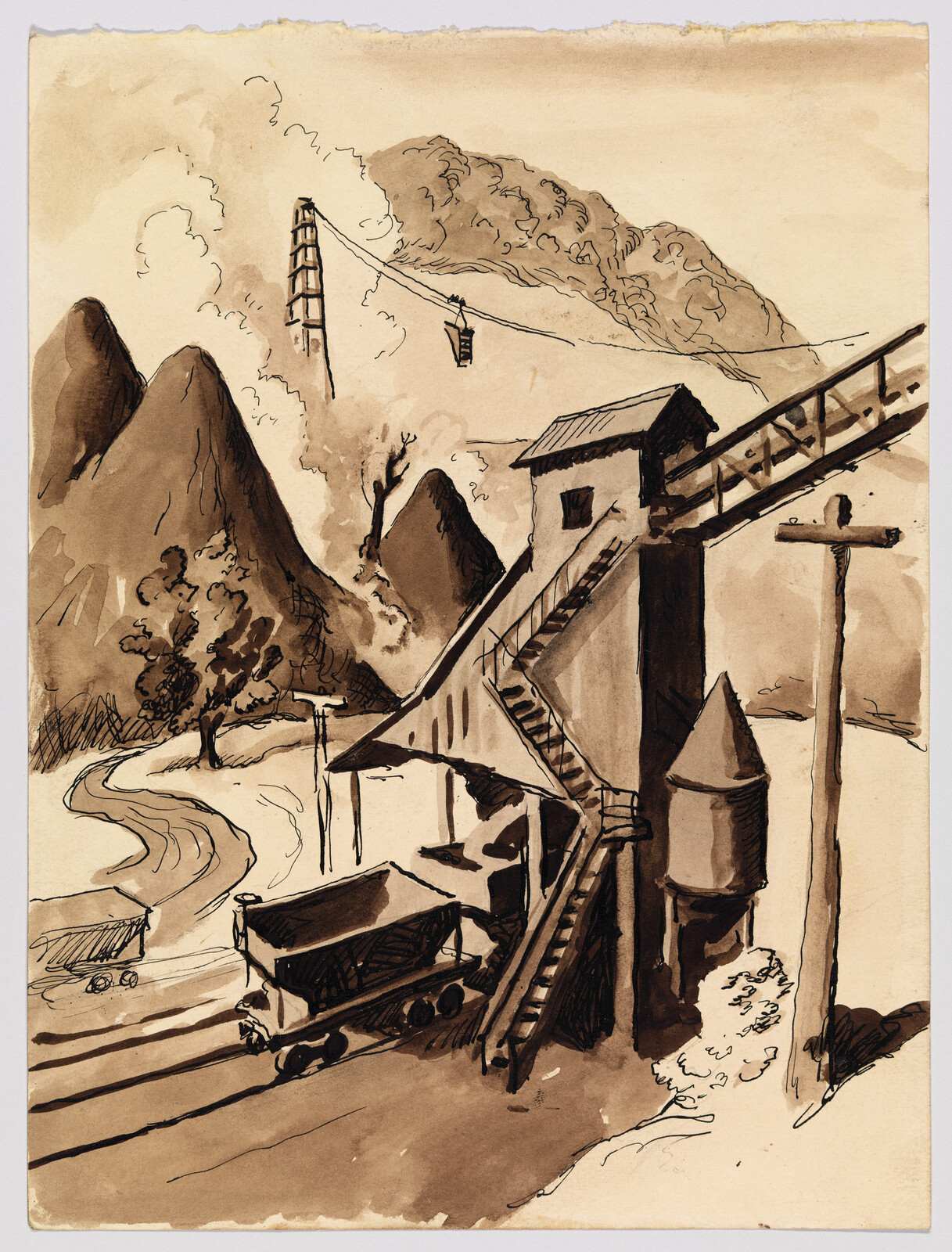 A mining station with ore carts on tracks and a wooden elevated chute against mountains.