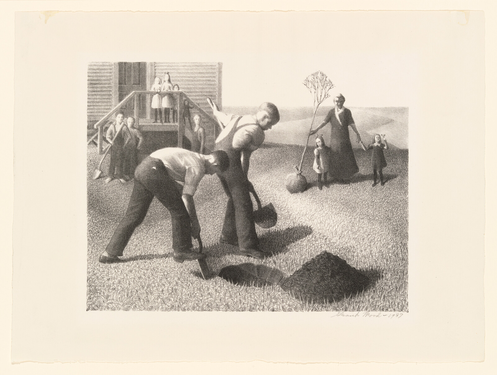 Two men dig a hole in the yard while a woman and children watch nearby.