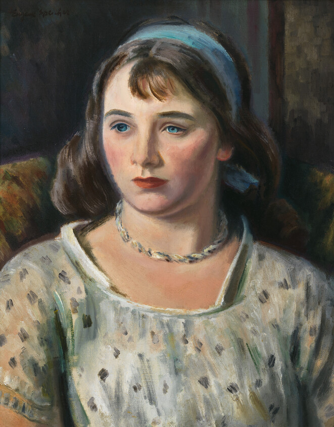 Young woman with blue headband and necklace looks thoughtfully to the side.