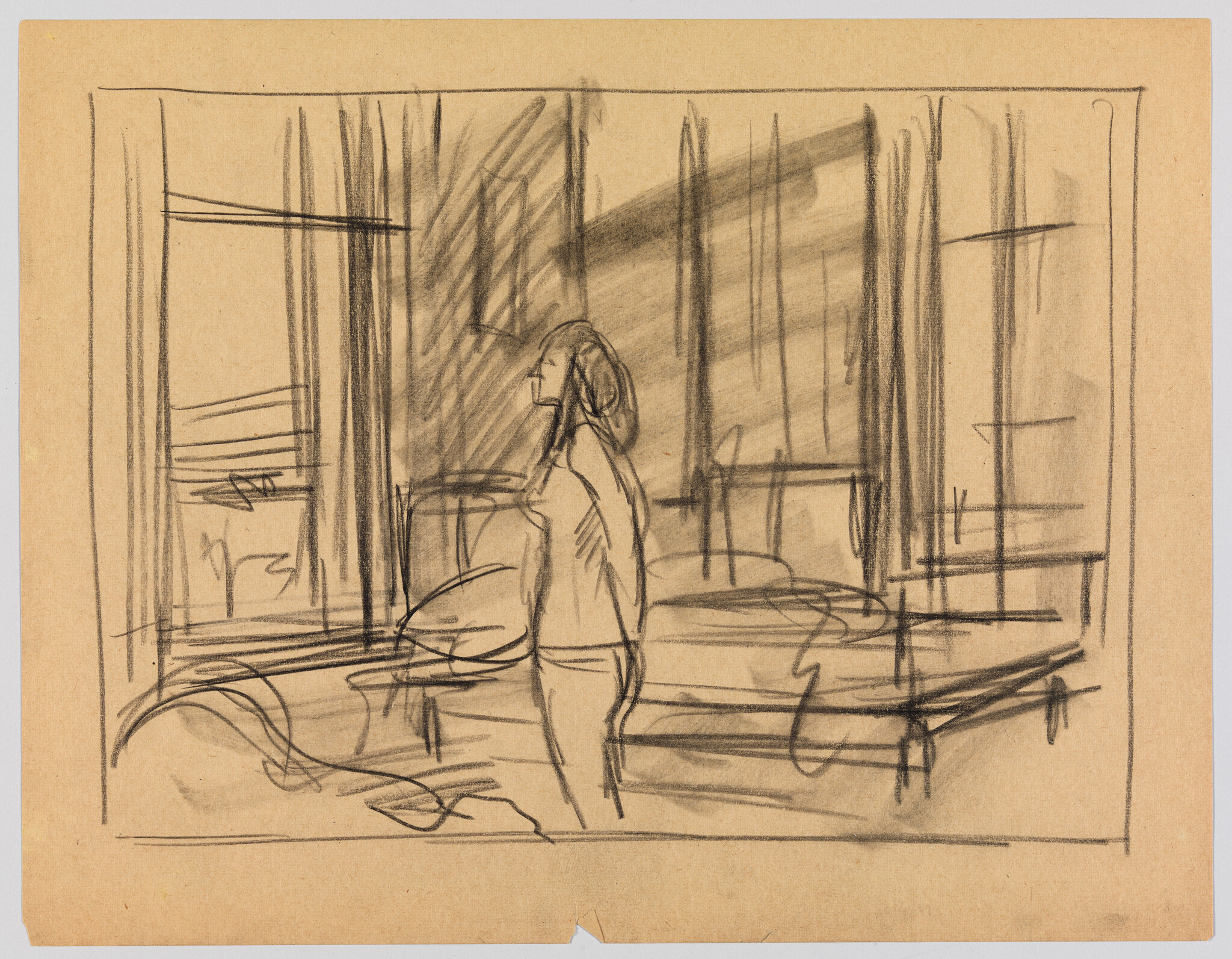 A person stands in a bedroom looking out a large window toward the light.