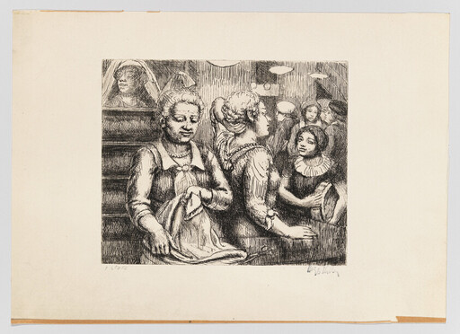 Three women stand at a crowded counter, one folding a cloth while the others talk.