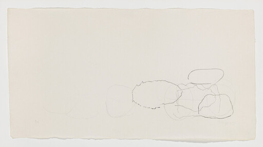 Several faint overlapping pencil ovals and scribbles clustered near the right side of a cream sheet.