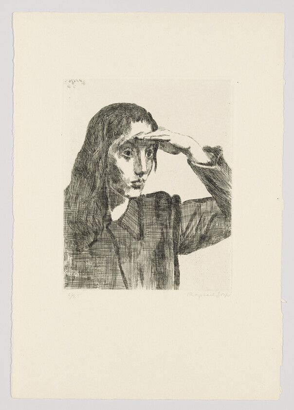 A woman raises her hand to shade her eyes while looking into the distance.