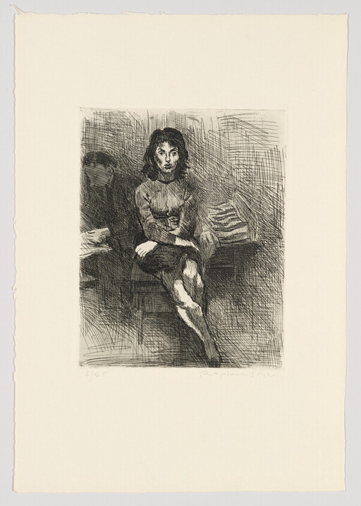 A young woman sits with crossed legs and folded arms while a man reads nearby.