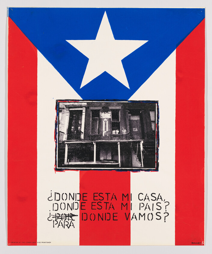 A graphic poster featuring a large Puerto Rican flag with a white star on a blue triangle, and red and white stripes. Overlaid on the flag is a black and white photograph of a building's facade. Below the image, text in Spanish reads "¿DONDE ESTA MI CASA, DONDE ESTA MI PAIS, DONDE VAMOS?" which translates to "Where is my house, where is my country, where are we going?" The bottom of the poster includes the text "PRINTED AT THE LOWER EAST SIDE PRINTSHOP" and a small logo with the word "BULLET".