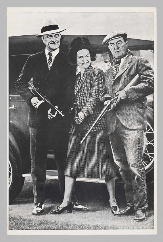 Black and white photo of three people standing side by side, each holding a vintage toy gun. The person on the left is wearing a suit, tie, and fedora, the middle person is in a polka dot dress and a fur hat, and the person on the right is in a patterned suit and flat cap. They are standing in front of a classic car, giving the impression of a vintage gangster scene.