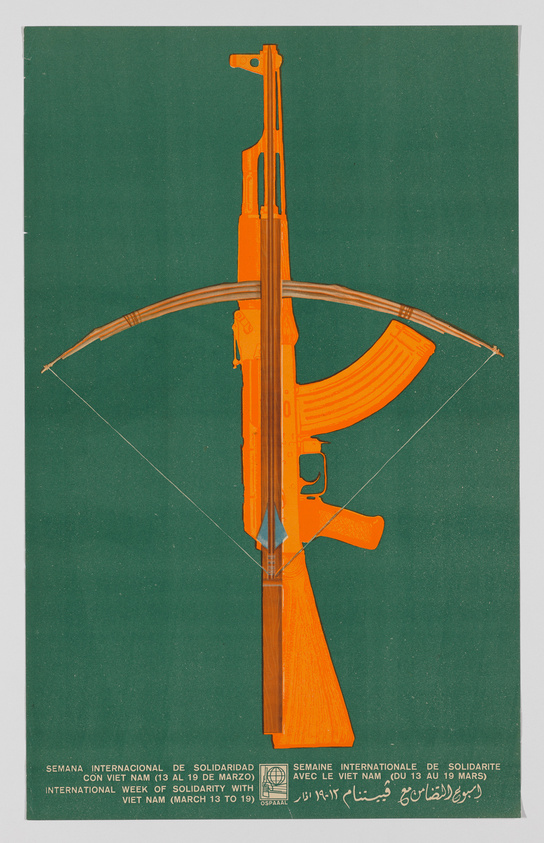 A graphic poster featuring a bright orange AK-47 rifle transformed into a crossbow against a green background. Below the image, text in Spanish, French, and English announces the "International Week of Solidarity with Viet Nam (March 13 to 19)" along with logos and Arabic script.