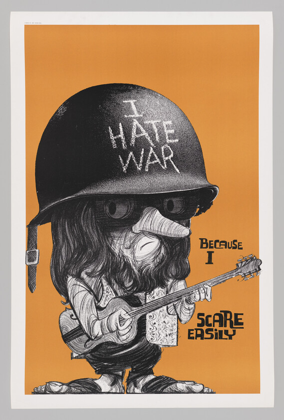 Bearded long-haired musician wearing a helmet labeled "I hate war" plays guitar with text "Because I scare easily."