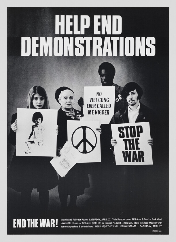Four protesters hold peace and antiwar signs calling to stop the war and end demonstrations.