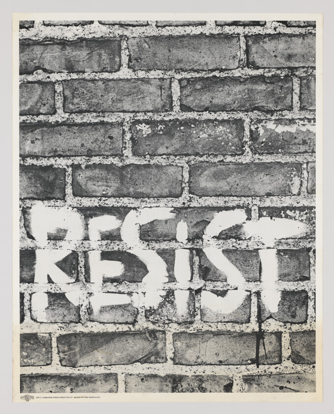 A brick wall with the word "RESIST" spray-painted in large white letters across it.