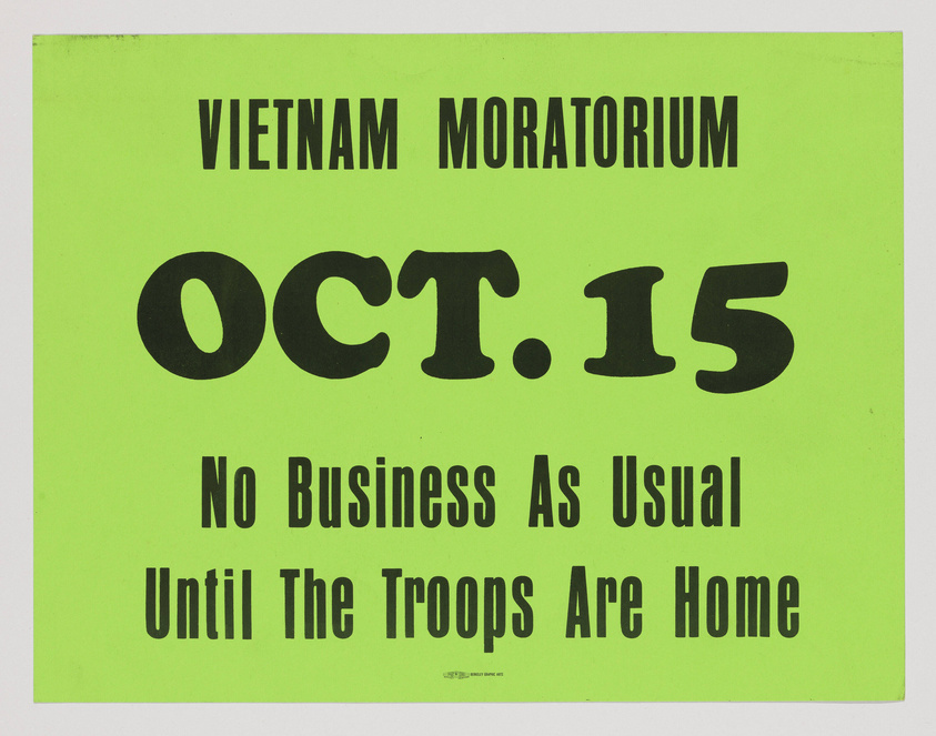 A bright green poster with bold black text that reads "VIETNAM MORATORIUM OCT. 15 No Business As Usual Until The Troops Are Home." The text is arranged in a block format with "OCT. 15" prominently displayed in the center.