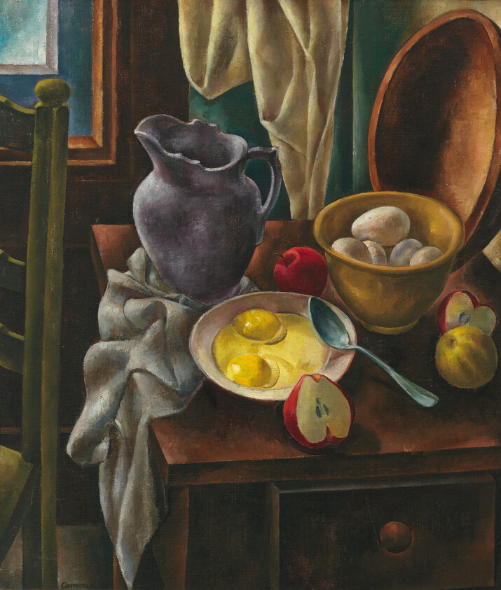 A table with a pitcher, bowl of eggs, a plate with two egg yolks and sliced apples.