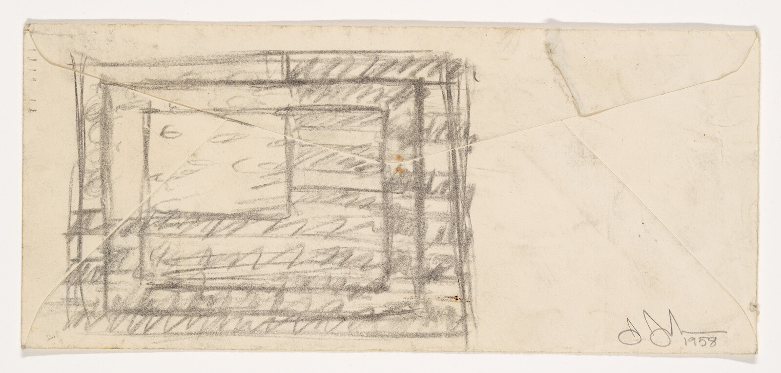 An old envelope with a rough pencil sketch of overlapping nested rectangles and shading.