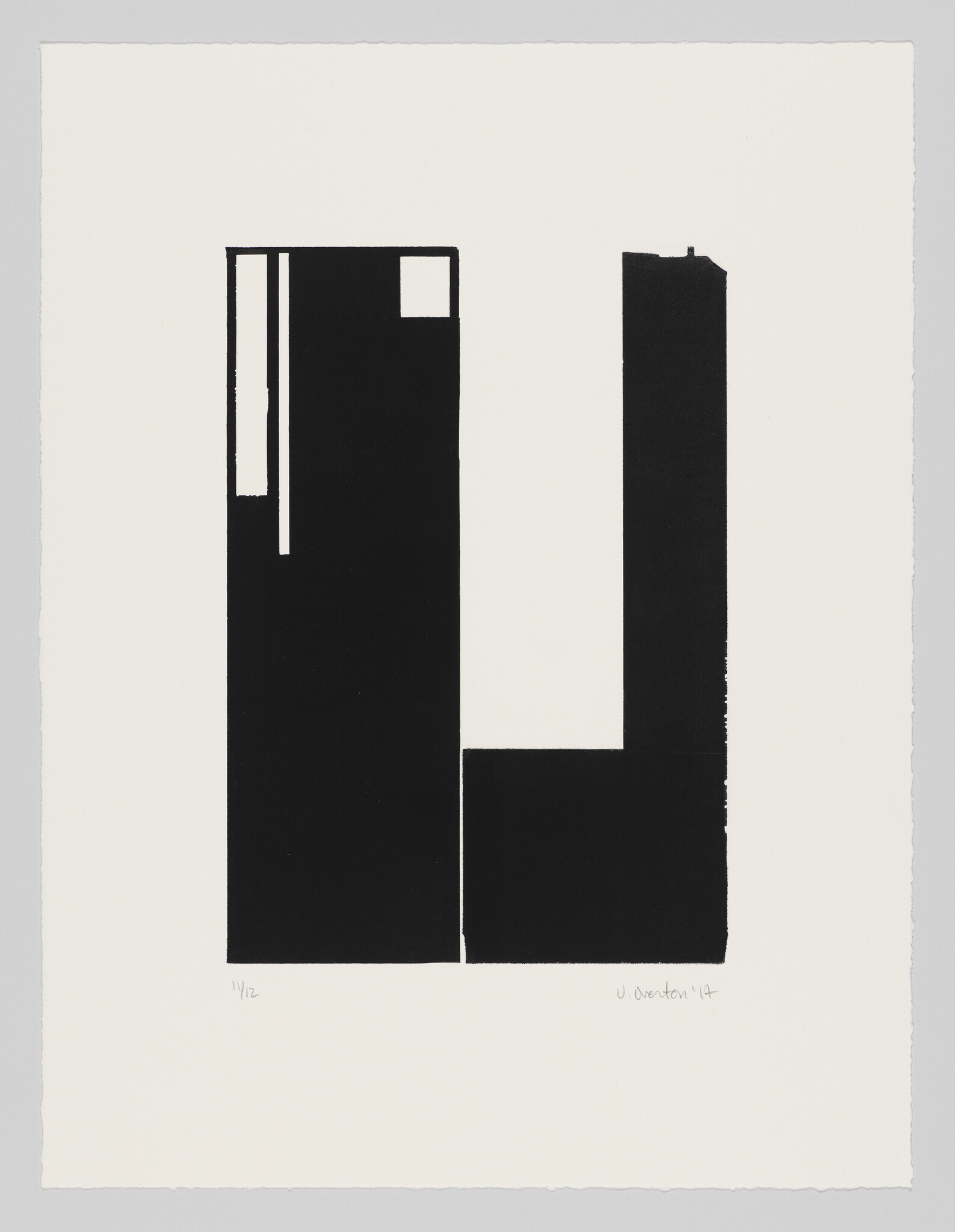 Two tall black rectangular blocks form a minimalist U-shaped negative space on white paper.