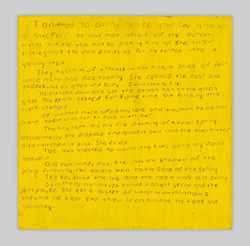 Handwritten story text in pencil on a bright yellow painted canvas covering the whole surface.