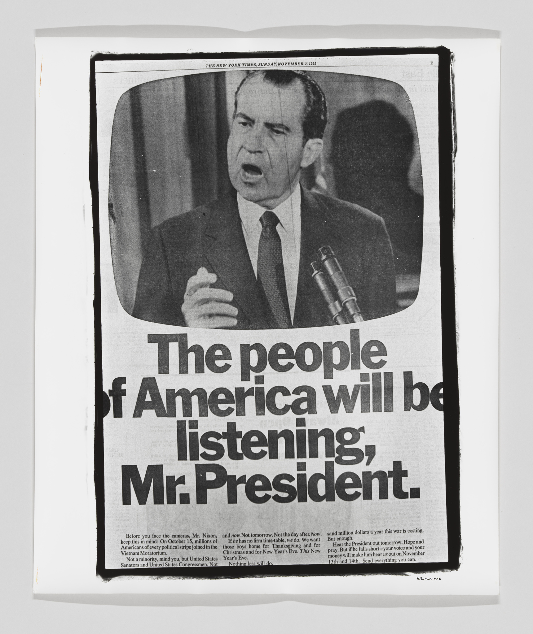 A black and white photograph of a newspaper clipping featuring a man speaking into microphones with the headline "The people of America will be listening, Mr. President." The paper is slightly crumpled and mounted on a white background.