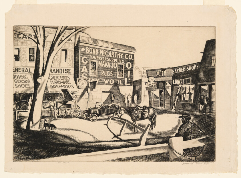 Small town street scene with parked car, horses, and storefronts advertising Navajo rugs and a cafe.