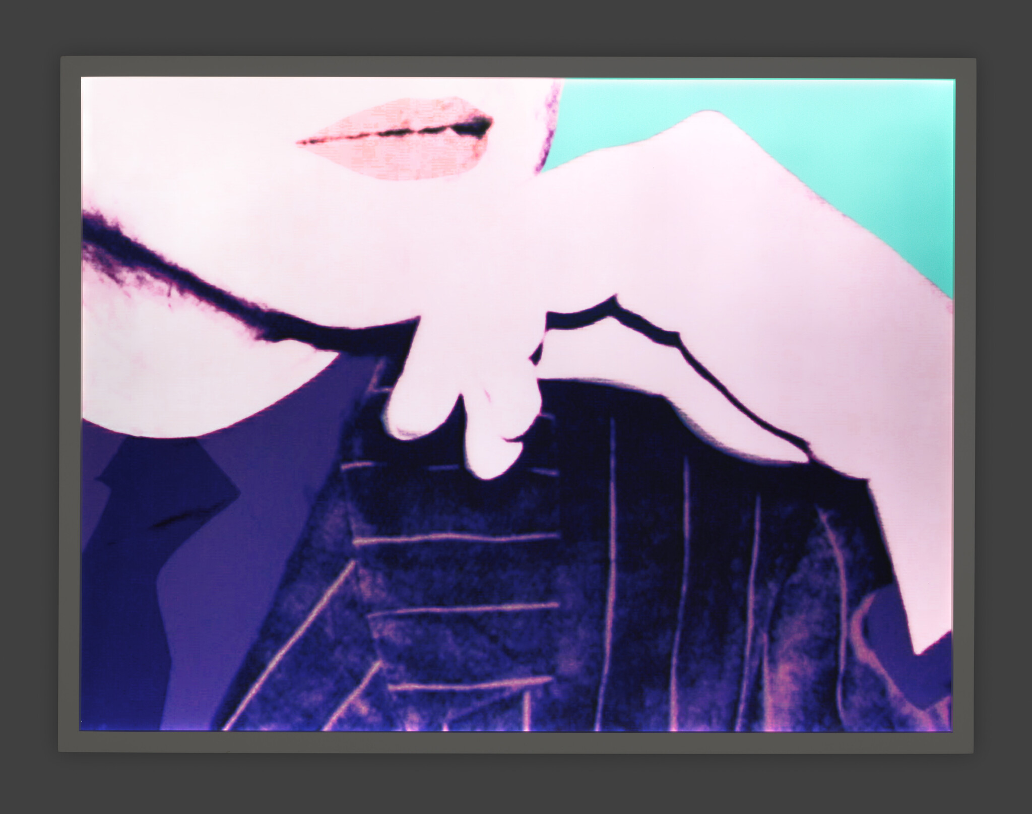 Close-up of a person’s lips and hand resting on their chin over a striped jacket.