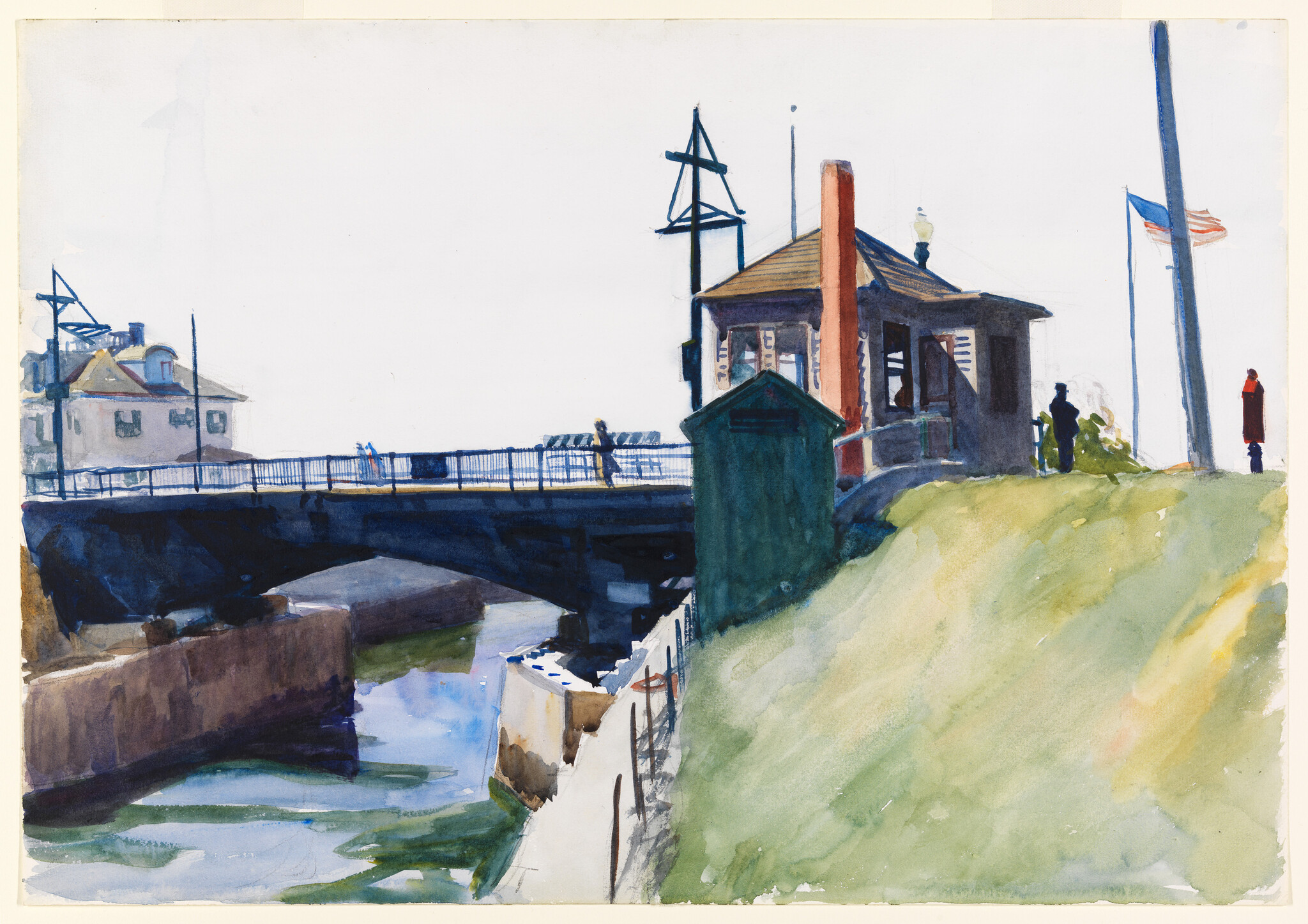 A small riverside bridge with a nearby pavilion, people walking, and an American flag.