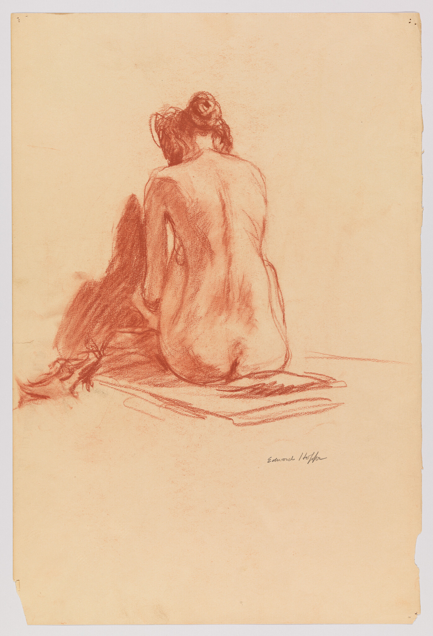 A red chalk sketch of a seated nude woman shown from the back with a hair bun.