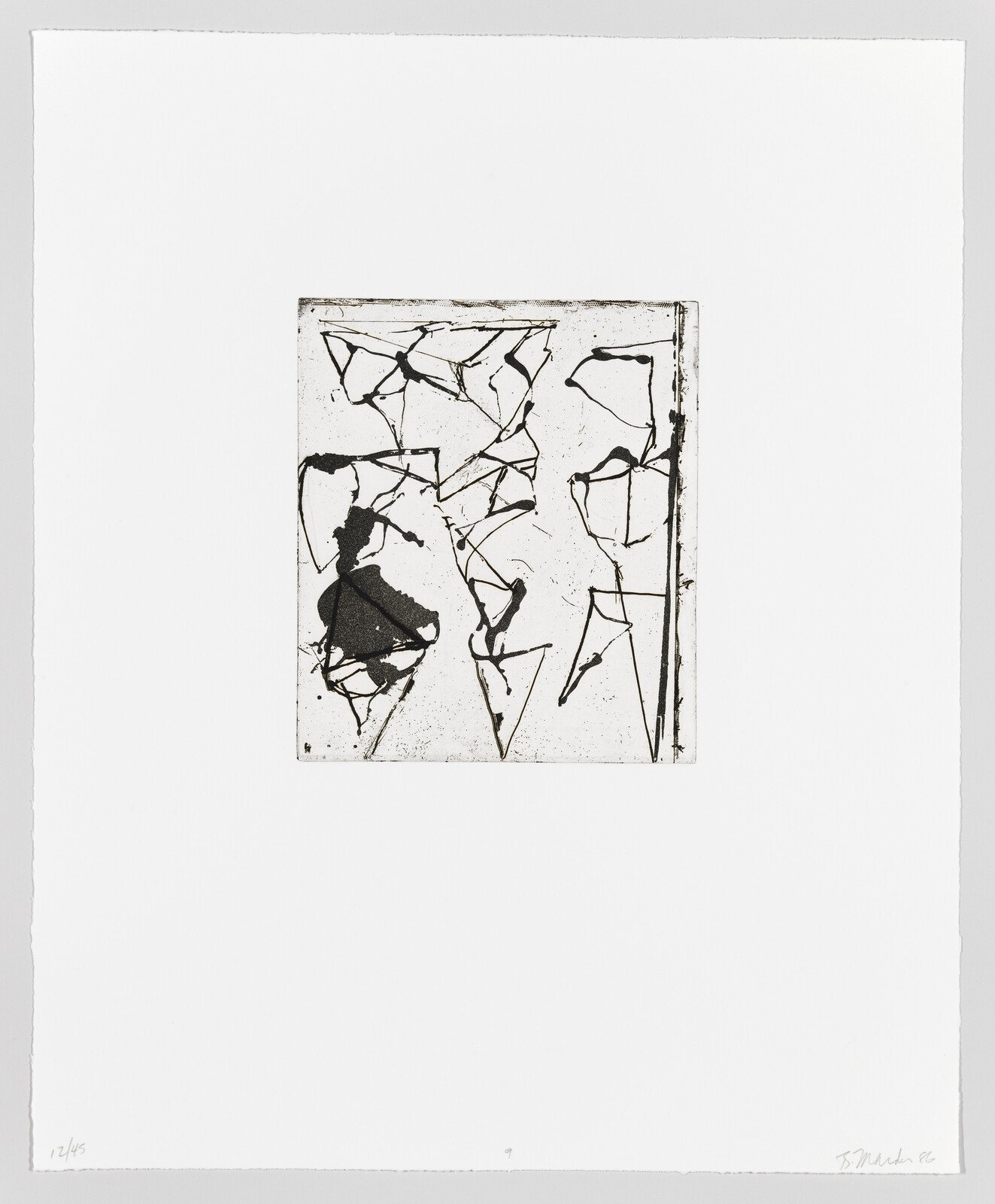 A black and white abstract etching with jagged lines and shapes on a square plate, centered on a larger white paper. The bottom left corner of the paper features a fraction (12/45), indicating the print number, and the bottom right corner has a signature and the year '86. The artwork conveys a sense of fragmentation or chaos.