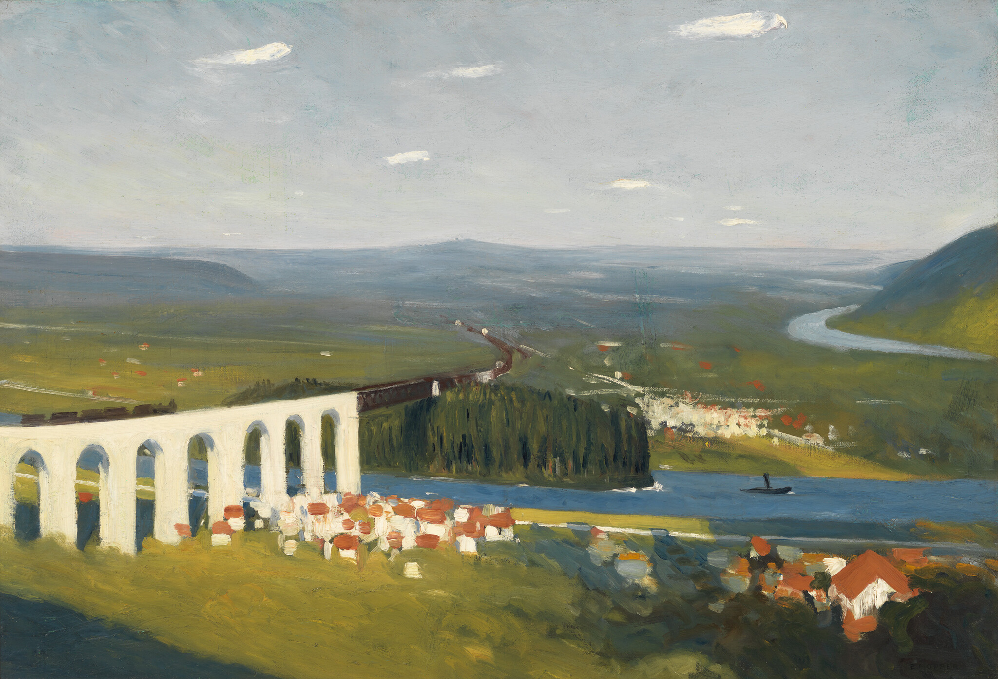 A white viaduct carries a train across a valley over a river near a small village.