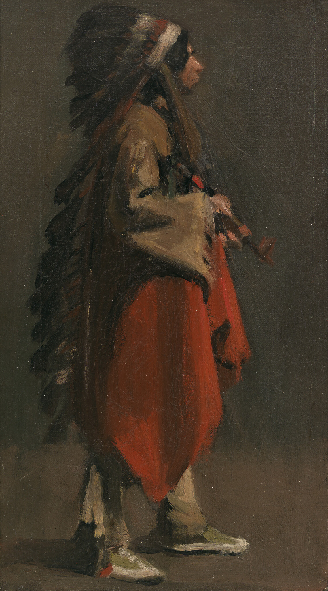 A Native American man in a feathered headdress stands in profile wearing a red robe.