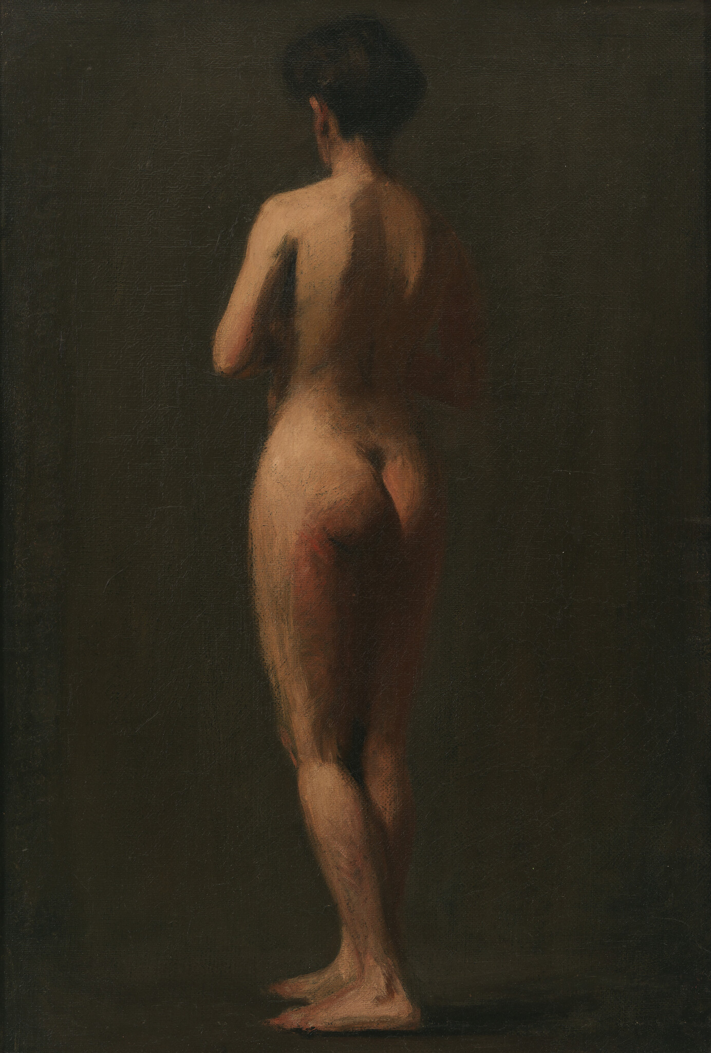 A nude person stands with their back to us and their hair is in a messy bun