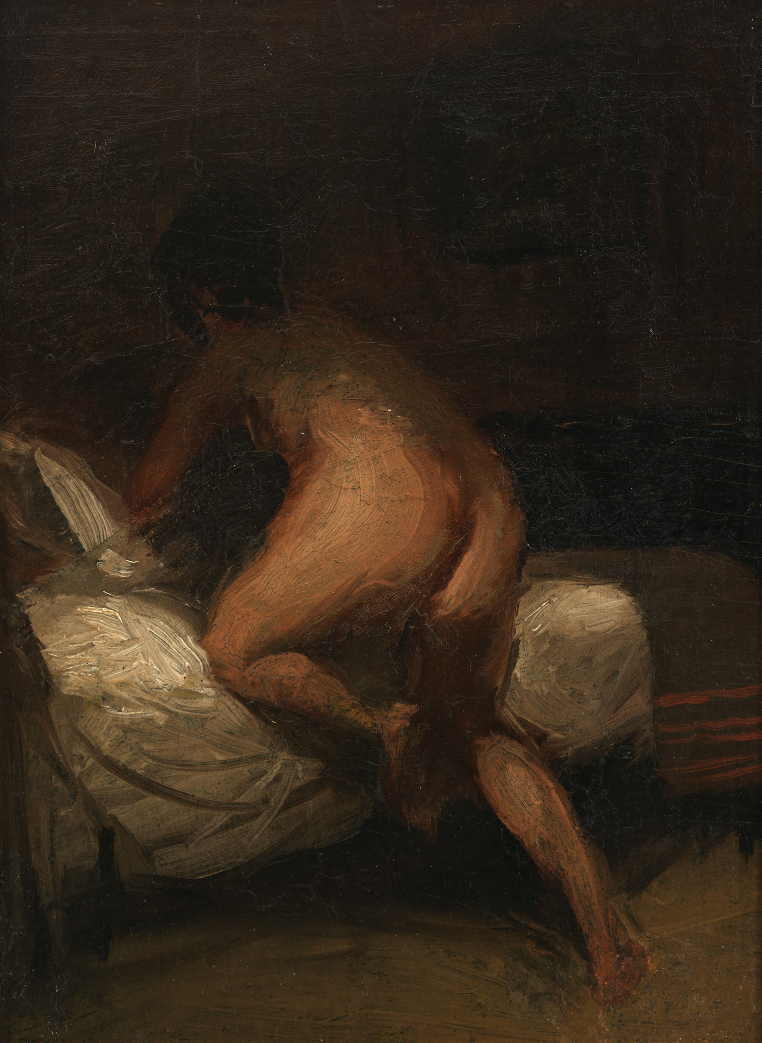 A explicit image of a white woman's crawing into her undone bed