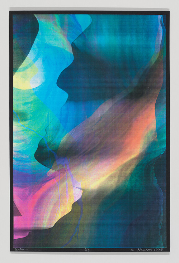 Abstract framed print showing flowing blue, green, pink, and orange wave-like shapes.