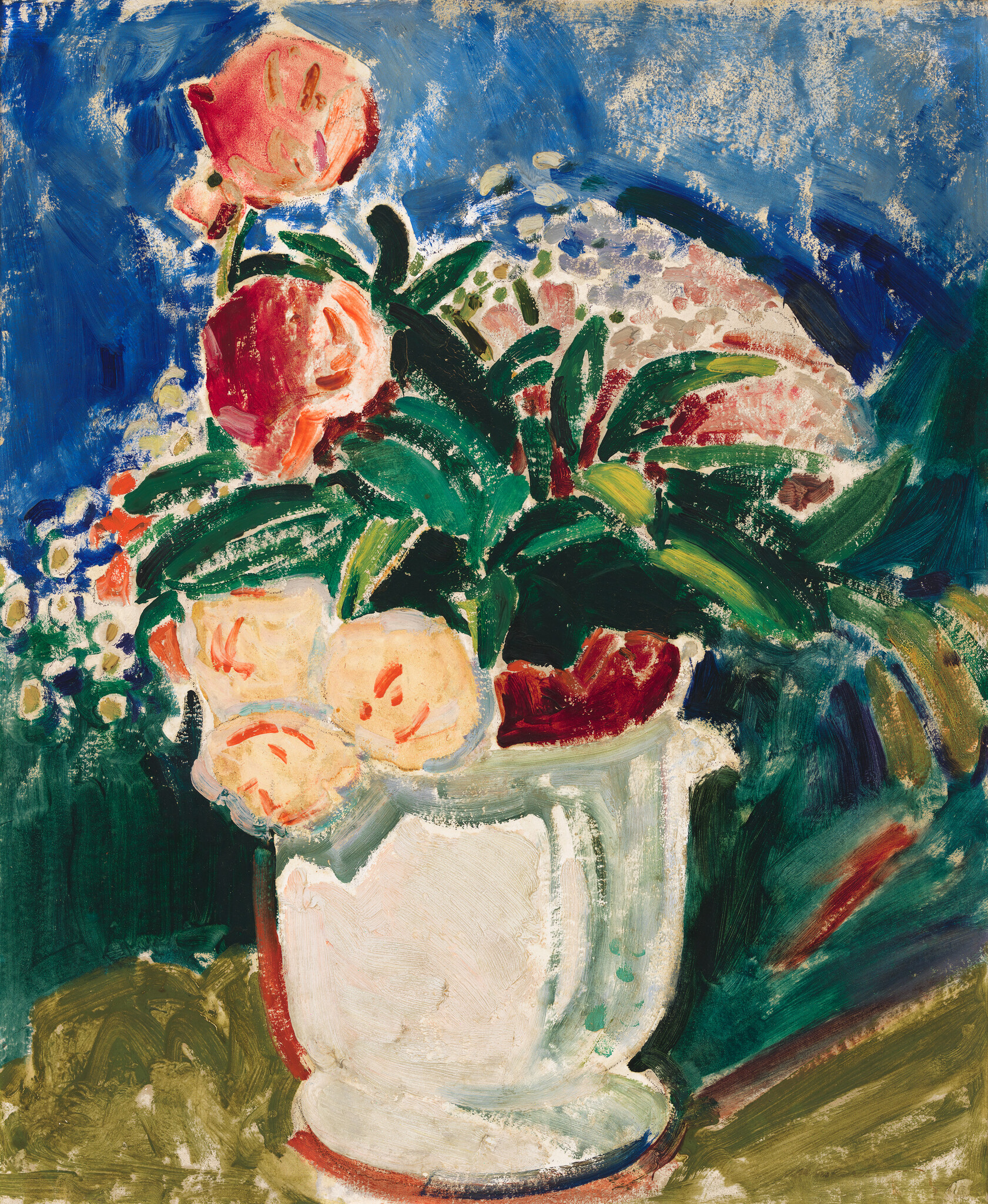 A white vase holds pink and red roses with green leaves against a blue background.