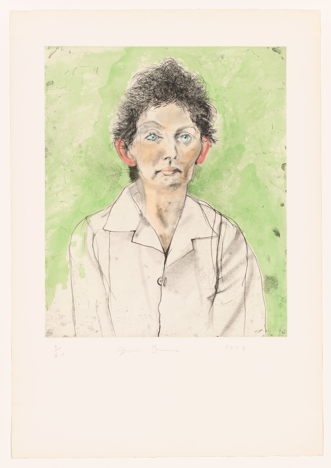 A portrait of a person with short dark hair and green eyes against a pale green background.