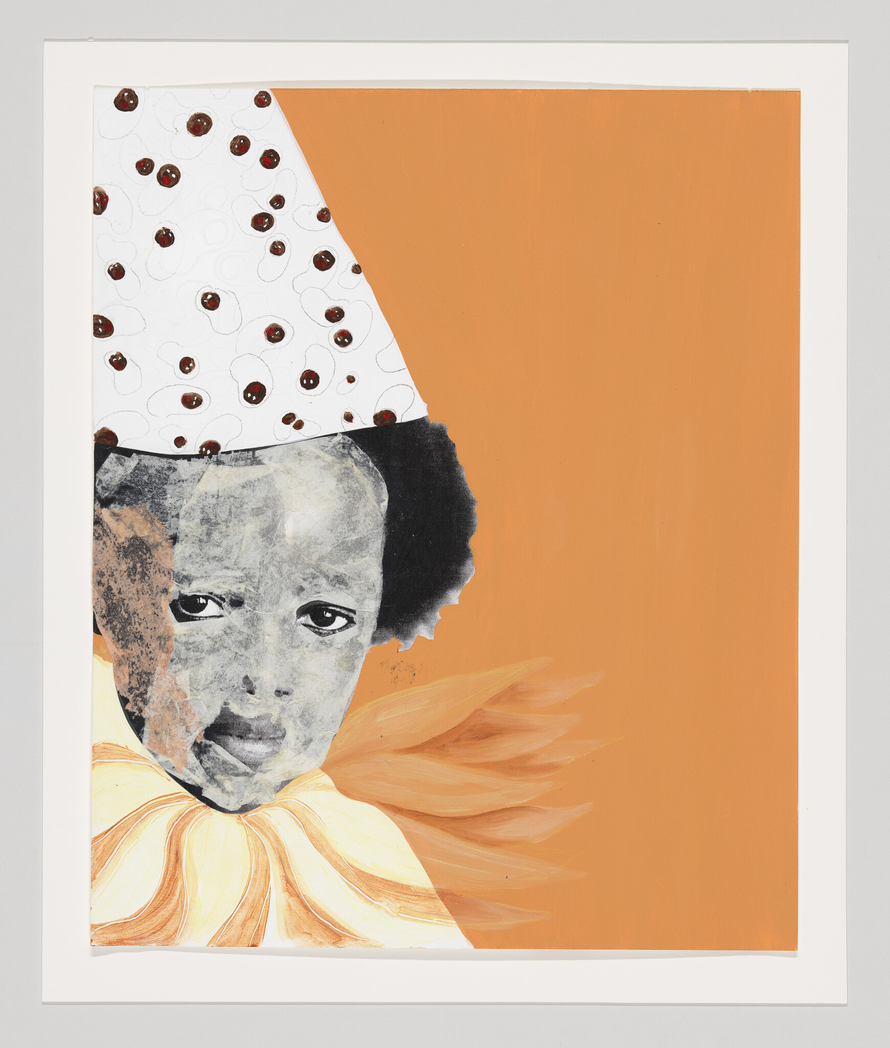 Child's portrait wearing a polka-dot hat and large ruffled collar against an orange background.