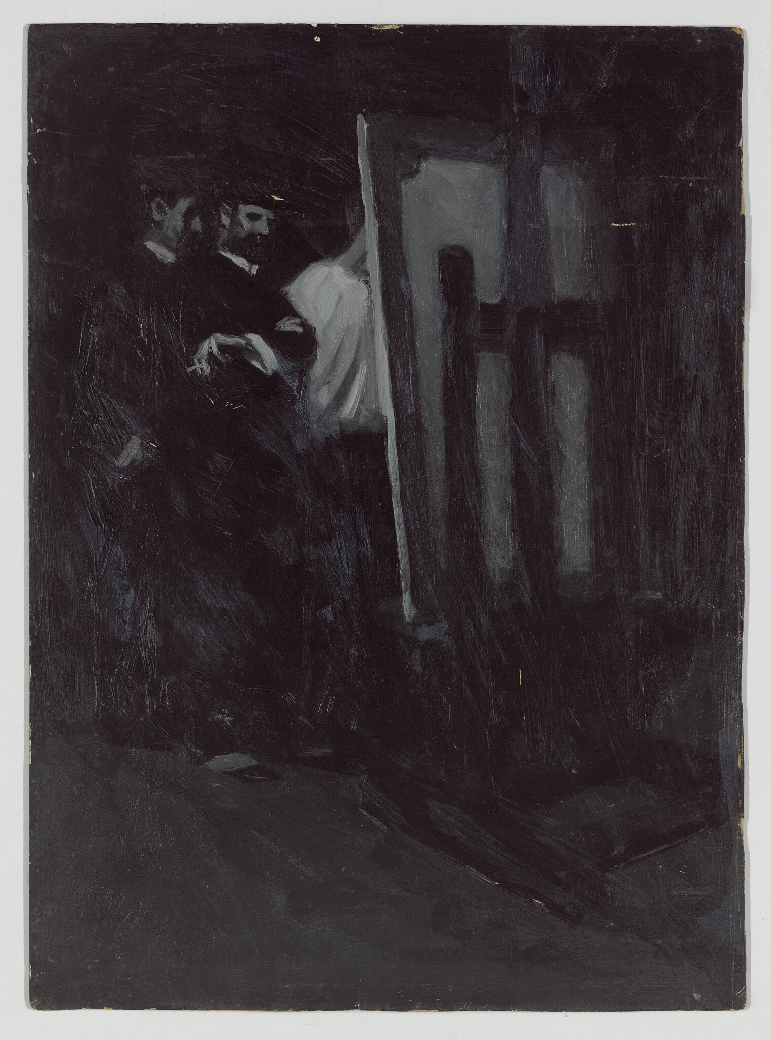 Three men stand near an easel in dim light, one wearing a white shirt.