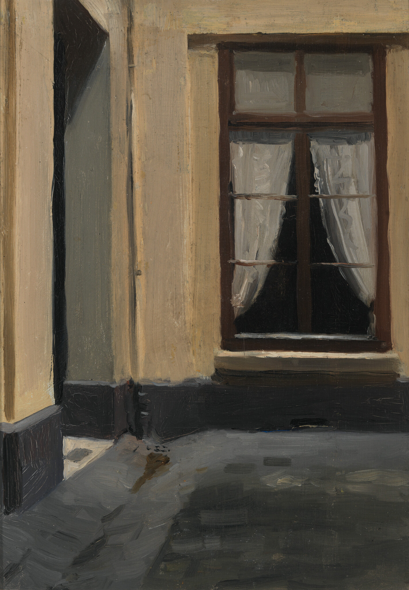 A narrow courtyard corner showing a closed window with white curtains and dark interior.