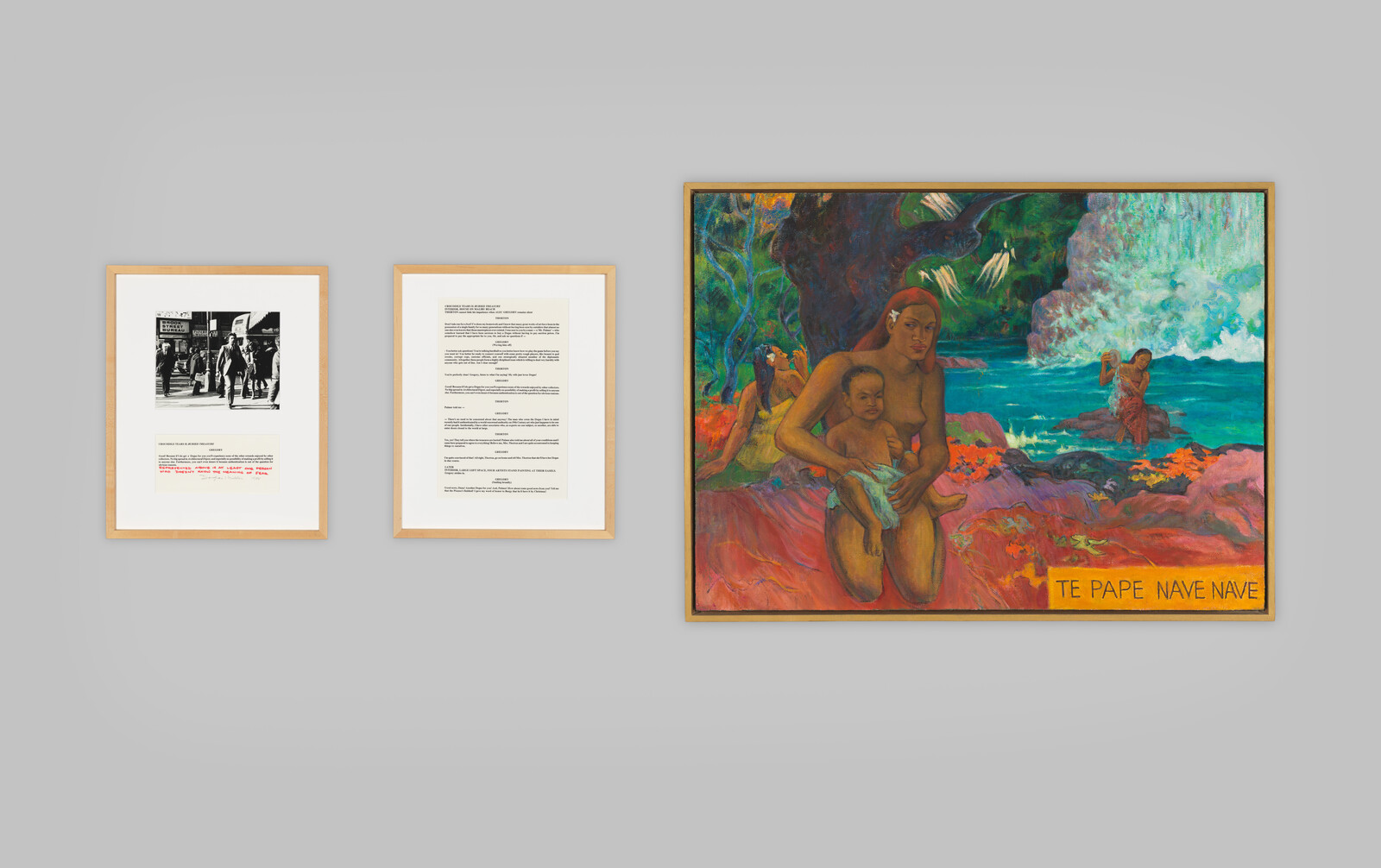 Three framed works on a gray wall, including a large painting of a seated mother holding a child.