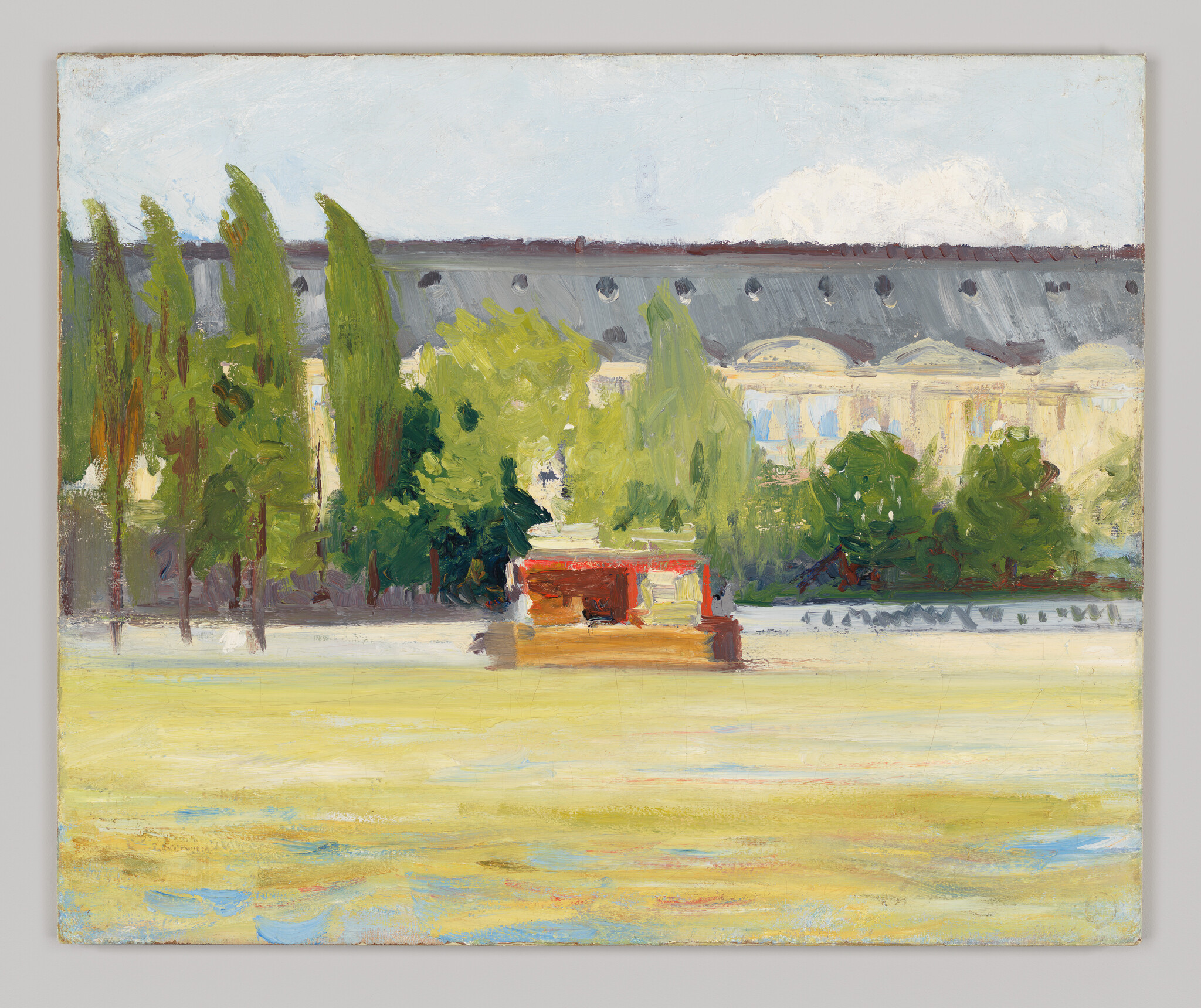 Small red boat moored on a calm river with tall trees and a light building behind.