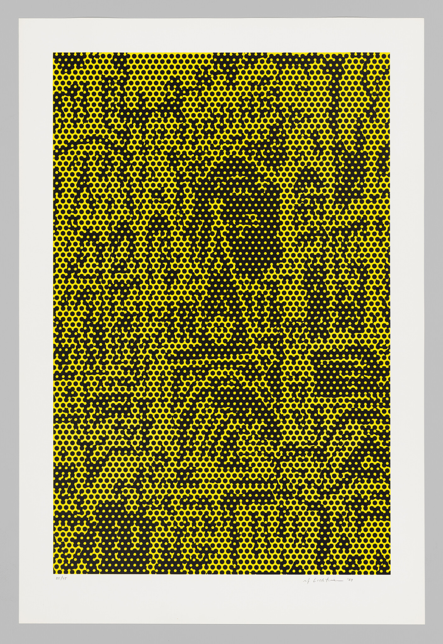 Yellow and black halftone dot pattern forming a stylized portrait of a person's face.