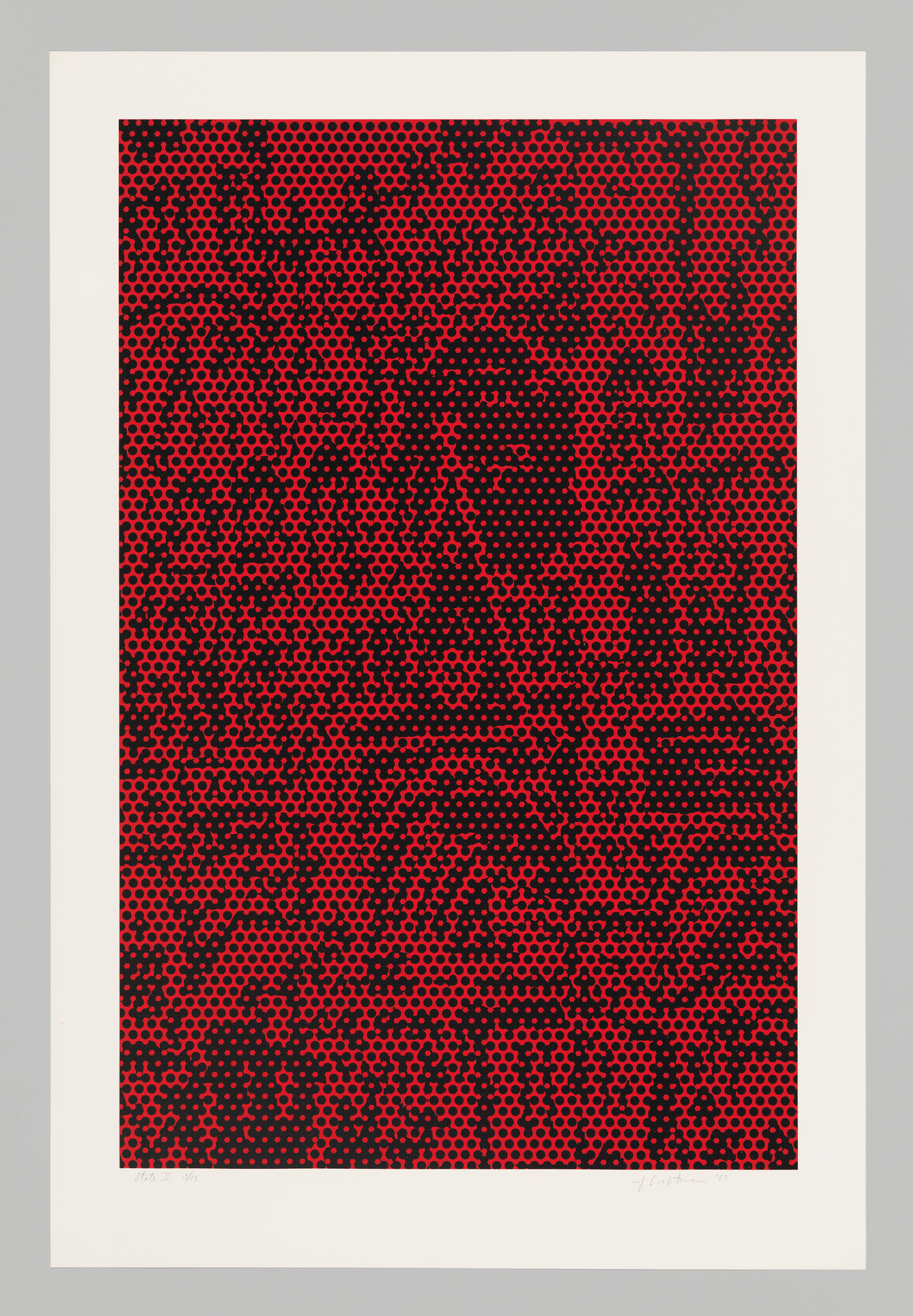 Large red and black dotted print forming a hidden face and abstract patterns within a white border.