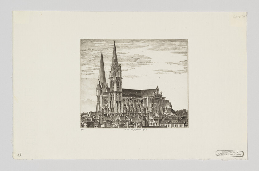 Large Gothic cathedral with two tall spires towering over nearby rooftops and city buildings.