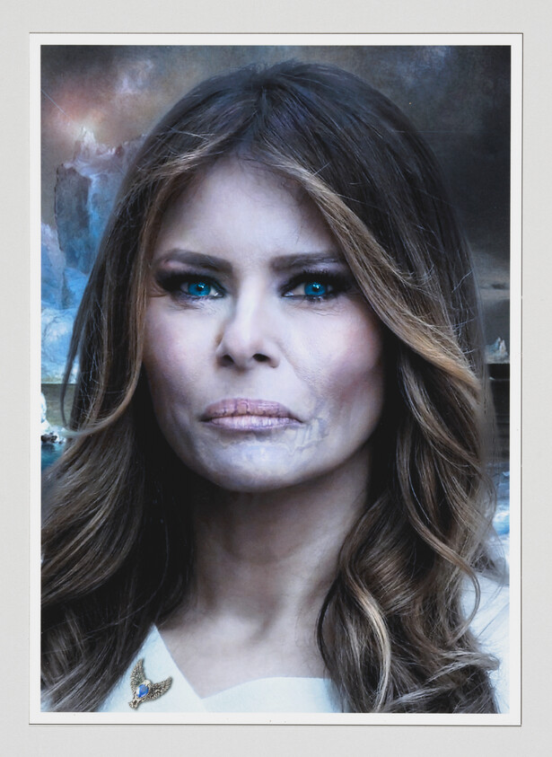 A close-up of a woman with long hair and glowing blue eyes against an icy, stormy background.