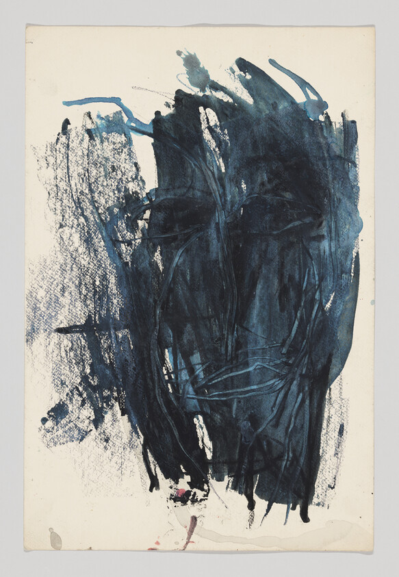 Large dark blue and black paint strokes cover most of a white sheet of paper.