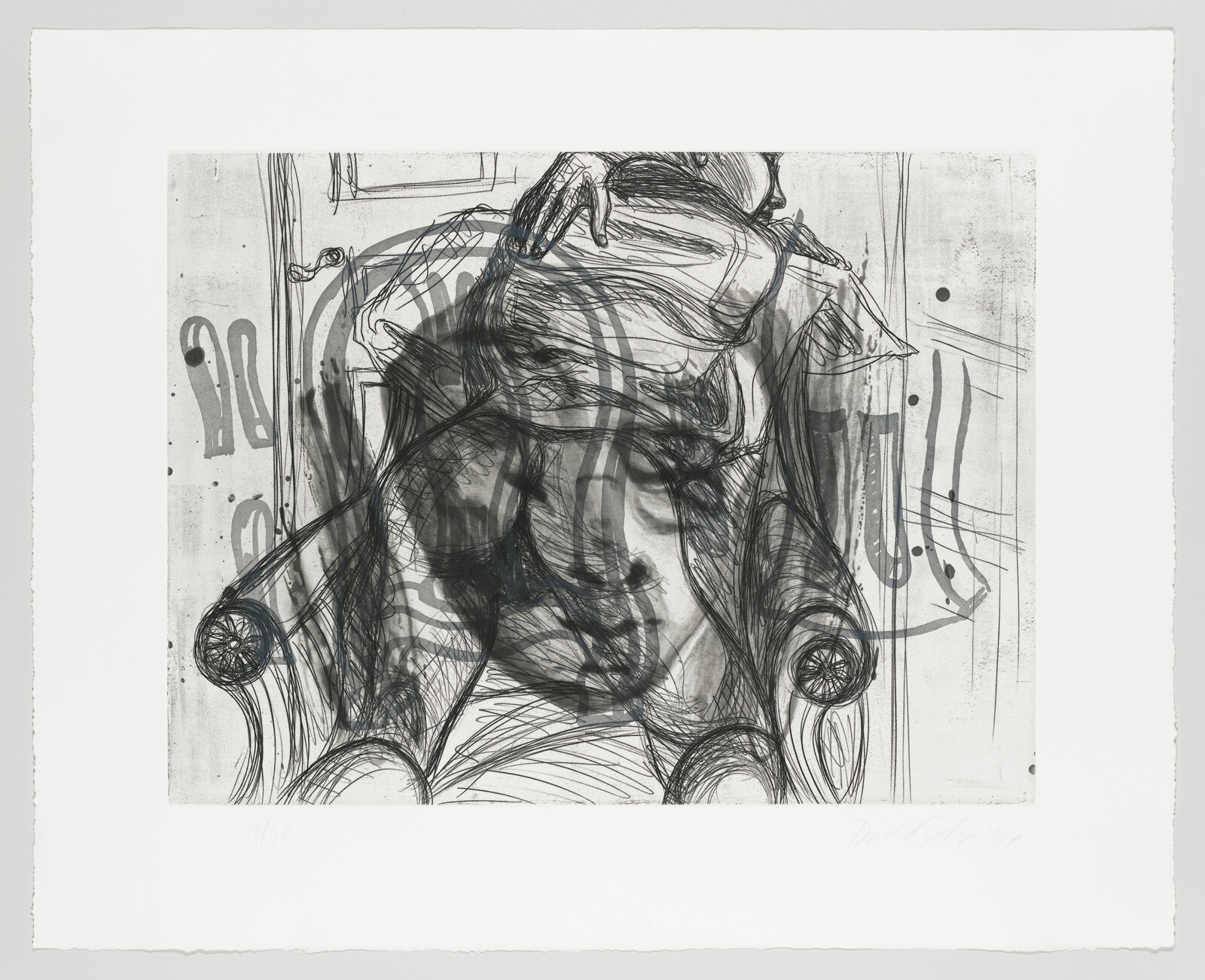 A figure curled forward in a large armchair, head resting on their arms.