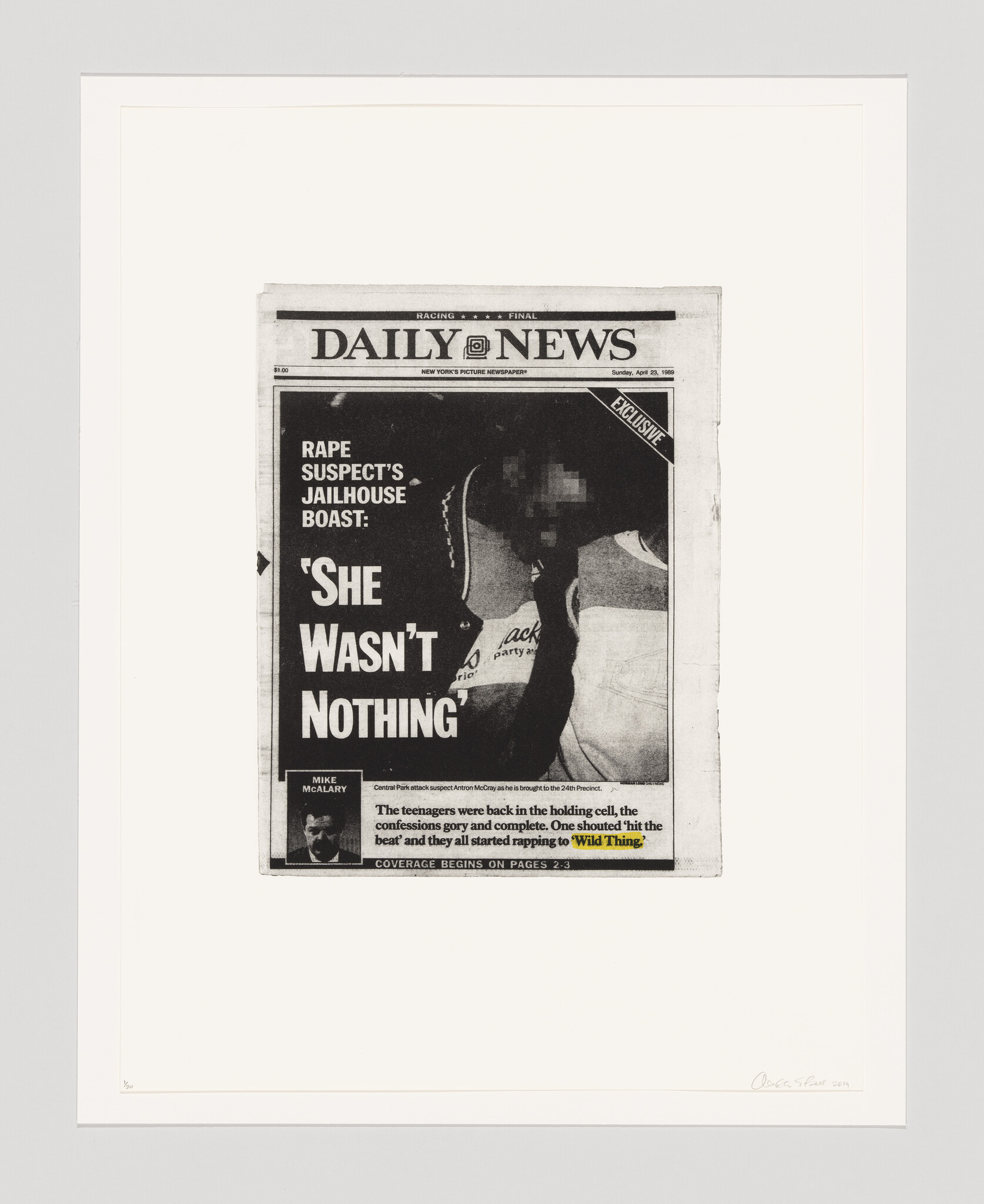 A framed artwork depicting a black and white reproduction of the front page of the Daily News newspaper with the headline "RAPE SUSPECT'S JAILHOUSE BOAST: 'SHE WASN'T NOTHING'". The page includes a photograph and text related to a news story, with additional text at the bottom indicating coverage continuation on other pages. The artist's signature is visible at the bottom right corner of the frame.