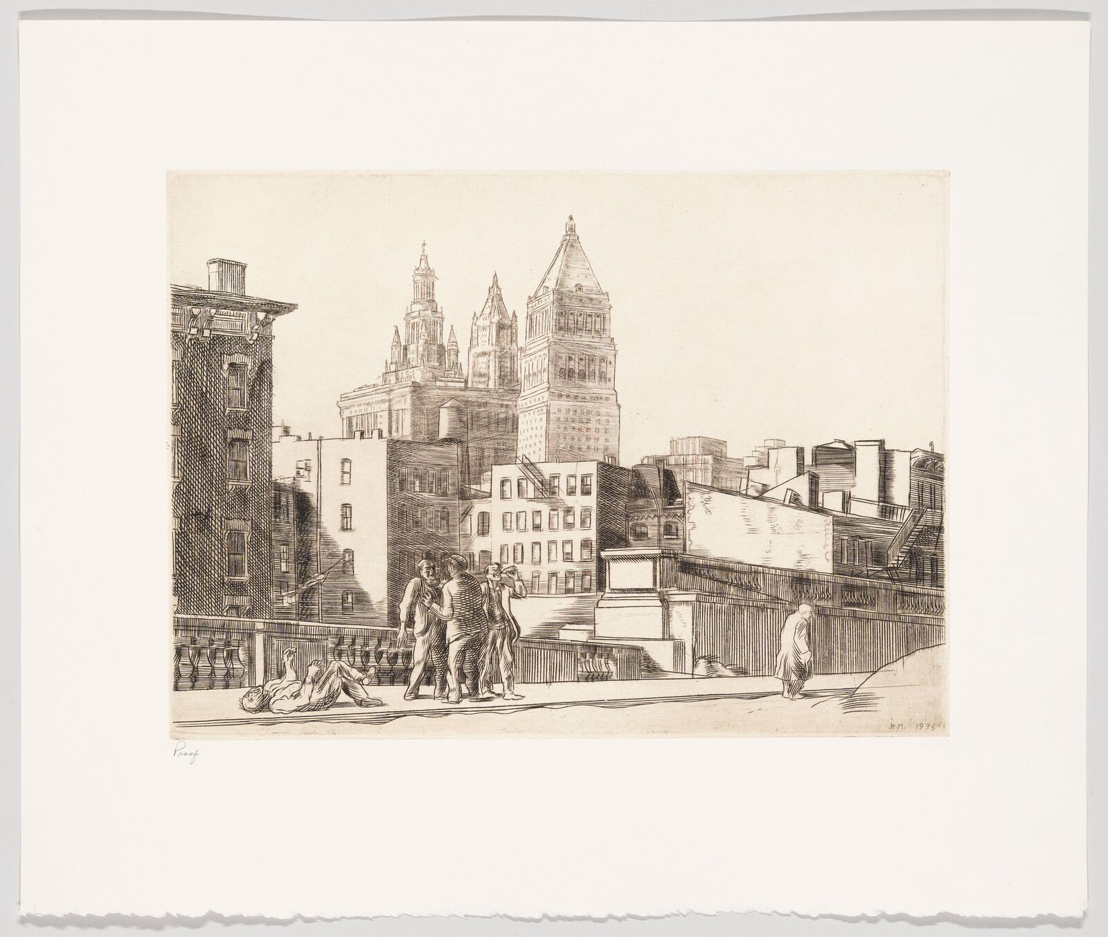 Group of people on a city bridge with tall buildings in the background, one person lying down.