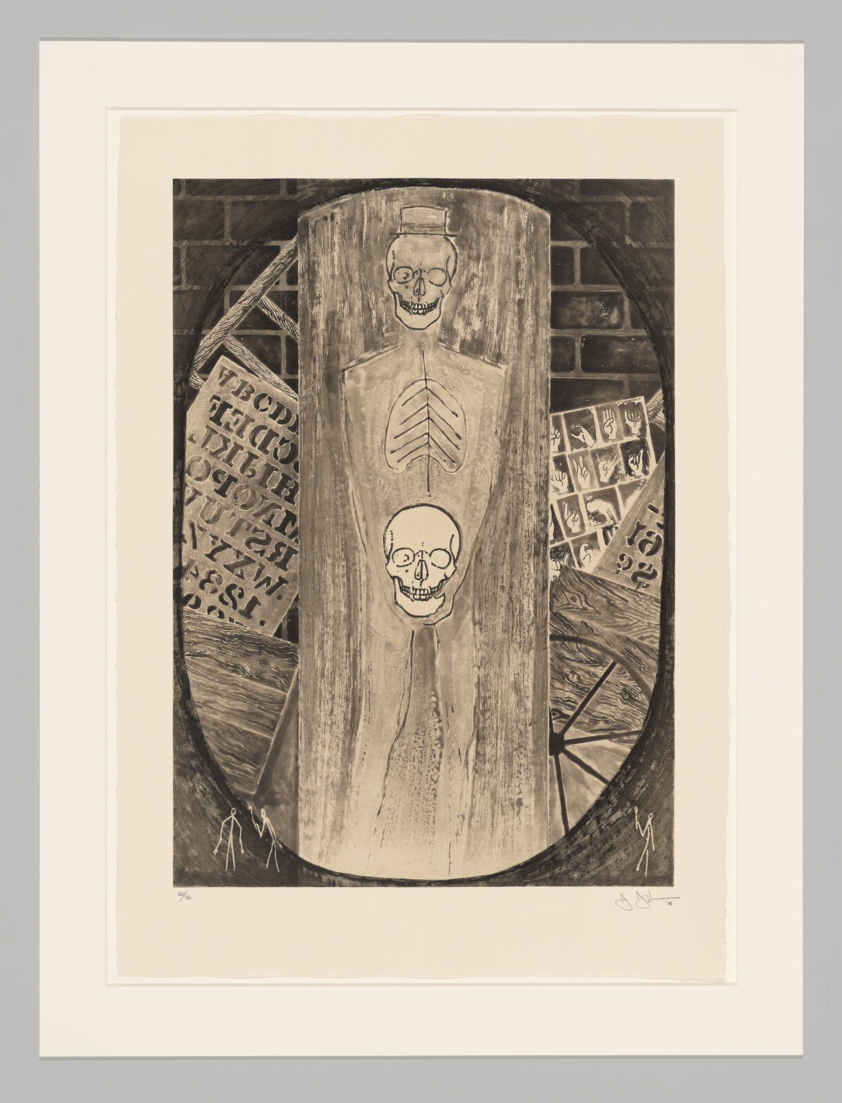 A wooden panel with two skull drawings and a ribcage stands against a brick background with stencils.